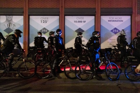 Heavily Geared NYPD Officers on Bicycles at Night, before Election