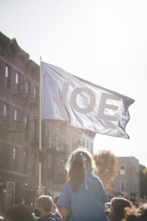 Joe Flag with Young Girl during Election Celebration, Brooklyn