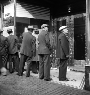 Group of Chinese Men reading News of the Surrender of Canton to the Japanese