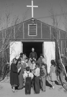 Group of People gathered outside Catholic Church