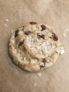 Sea Salt Chocolate Chip Cookies on Parchment Paper
