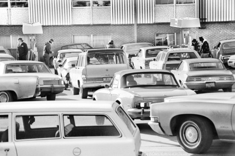 Cars lined up at Gas Station