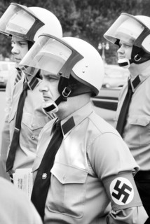 Protestors wearing Nazi Armbands