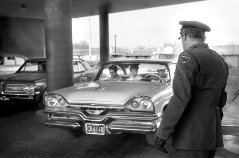 U.S. Immigration Officer watching as Car enters El Paso