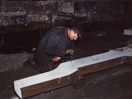Workman repairing broken Locomotive Frame