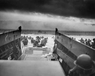 American Soldiers wading into Water after landing in Normandy