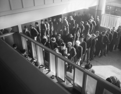 Men lined up to register for Unemployment Benefit