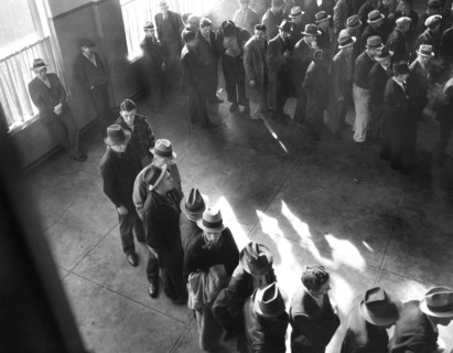 Men lined up to register for Unemployment Benefit