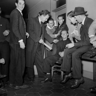 Group of Young Men waiting to Enlist at U.S. Navy Recruitment Headquarters
