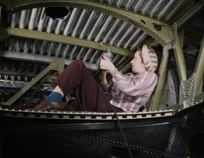 Woman riveting A-20 Bomber