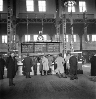 Group of People at Information Booth