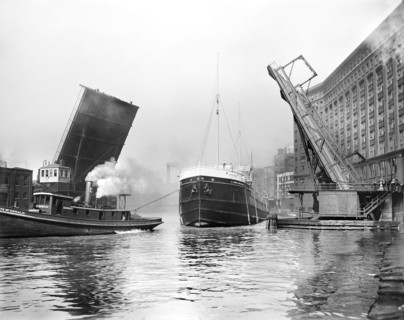 Freighter Arthur Orr and Tugboat Rita McDonald passing State Street bridge
