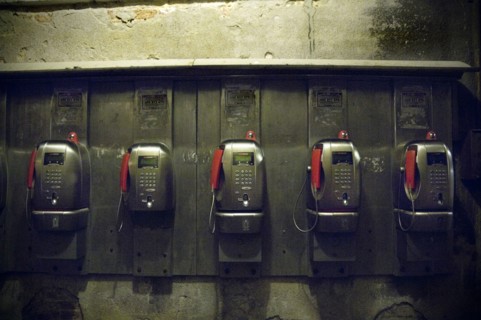 Row of Pay Telephones at Night