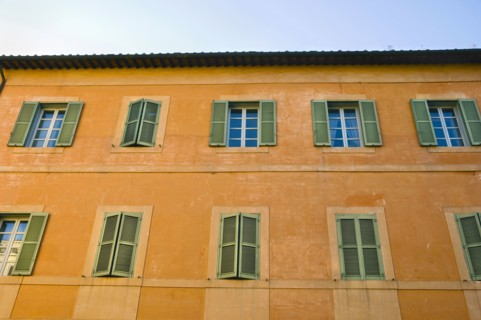 Shuttered Windows of Apartment Building