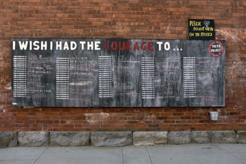 Public Chalkboard on Brick Wall