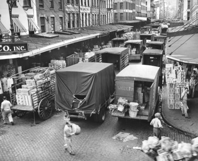 Trucks being loaded with Produce