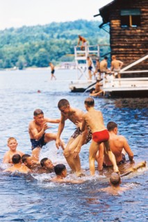Group of Summer Camp Boys playing in Lake
