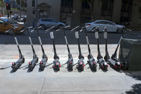 Street Scene with row of rental Scooters