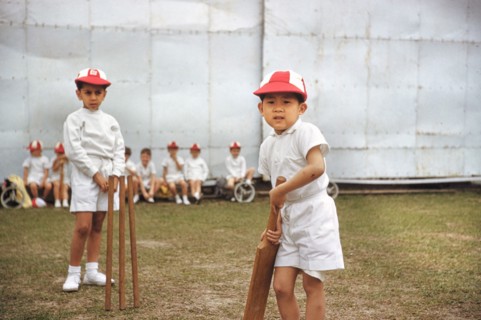 Young Boys playing Cricket