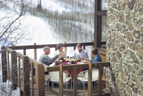 Former U.S. Secretary of Defense Robert McNamara with his wife Margaret and unidentified couple having lunch on Balcony