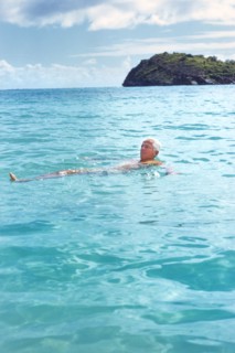 Man floating on Back in Water