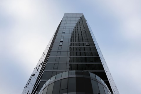 Low Angle View of Modern Glass Building Exterior