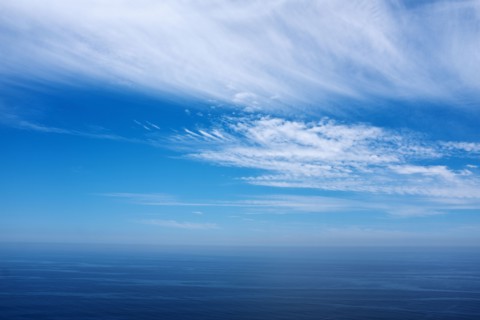 Clouds and blue sky over the Pacific Ocean