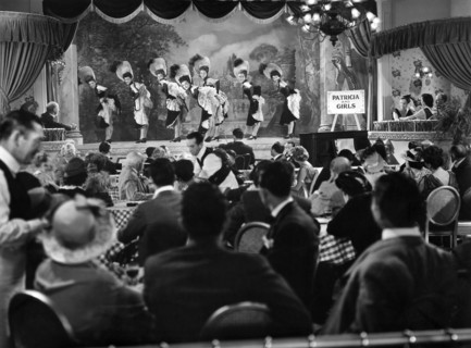 Nightclub Scene with Stage Production