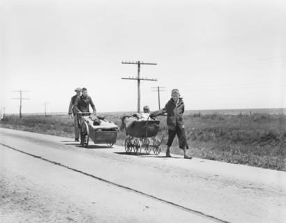 Flood refugees walking along Road four miles out of Memphis