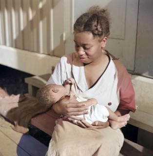 Mother with First Baby born in Okeechobee Migratory Labor Camp