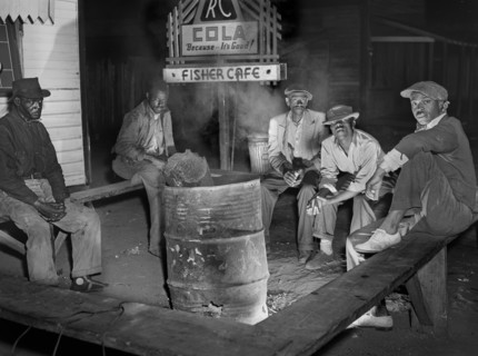 Laborers sitting around Fire on Saturday Night
