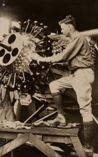 Charles Lindbergh working on engine of his airplane Spirit of St. Louis