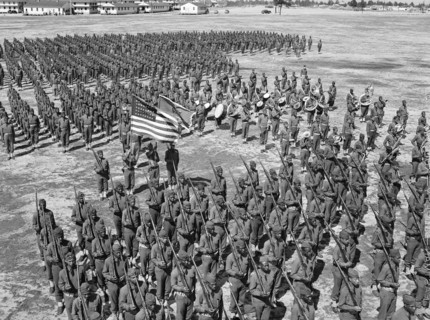 Soldiers of 41st Engineers in formation on Parade Ground with Sergeant Franklin Williams in color guard