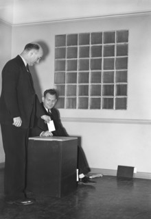 Man voting in community election