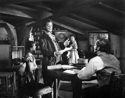 Paul Muni (standing)