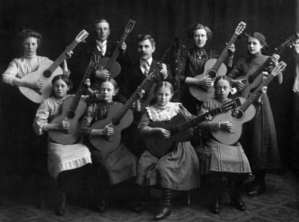 Portrait of a Group of Young Musicians with Acoustic Guitars