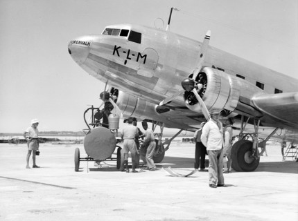 KLM Airplane being serviced t airport