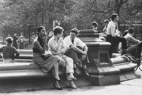 Group of people gathered around fountain