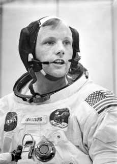Mission commander Neil A. Armstrong conducting final check of his communications system before boarding of the Apollo 11 mission
