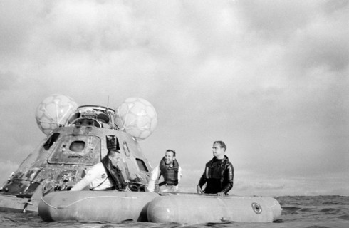 American Astronauts James A. Lovell Jr. (center)
