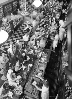 High angle view of lunchtime crowd at noon, People's Drugstore, G Street N.W., Washington, D.C.,