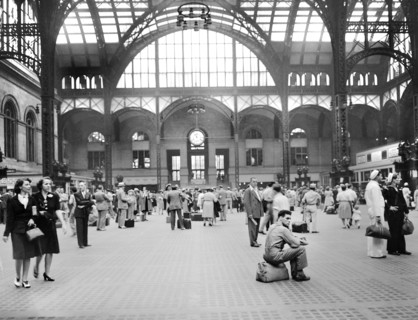 Crowd waiting for trains in main concourse, Pennsylvania Station, New York City, New York, USA,