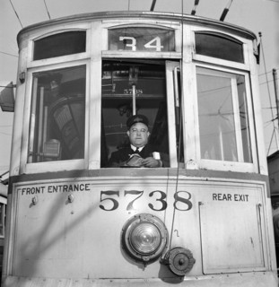 1917 vintage trolley, reconditioned because of wartime transportation pressure, and motorman,