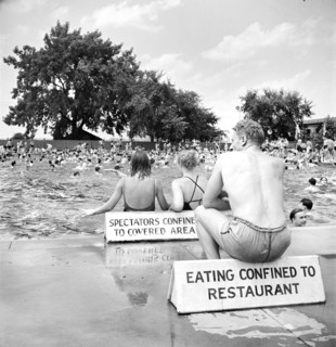 Large group of people enjoying community swimming pool on Sunday, Washington, D.C., USA, Marjory
