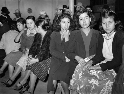Mexican pecan workers waiting in union hall for assignment to work. San Antonio, Texas, USA,