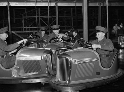 Marines riding electric automobiles, Mission Beach amusement center, San Diego, California, USA,