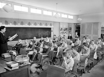 Schoolchildren in classroom at FSA (Farm Security Administration) farm workers' community, Eleven