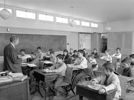 Schoolchildren in classroom at FSA (Farm Security Administration) farm workers' community, Eleven