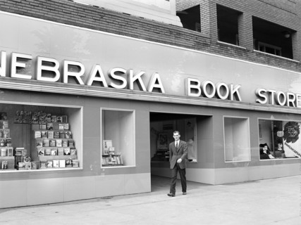 John Cockle walking out of campus bookstore, University of Nebraska, Lincoln, Nebraska, USA, John