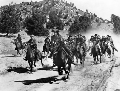 Max Baer (center), on-set of the film, "Buckskin Frontier", United Artists, 1943